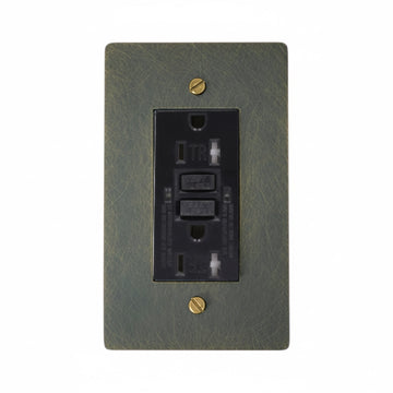 Brushed bronze brass wall  plate with black electrical GFCI outlet on a white background