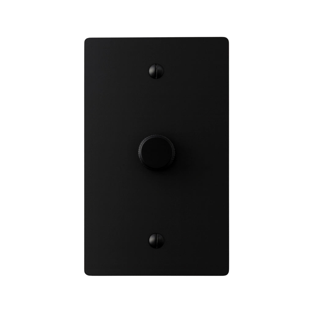 Matte black single dimmer switch with brass rotary knob — modern minimalist light dimmer for home interiors
