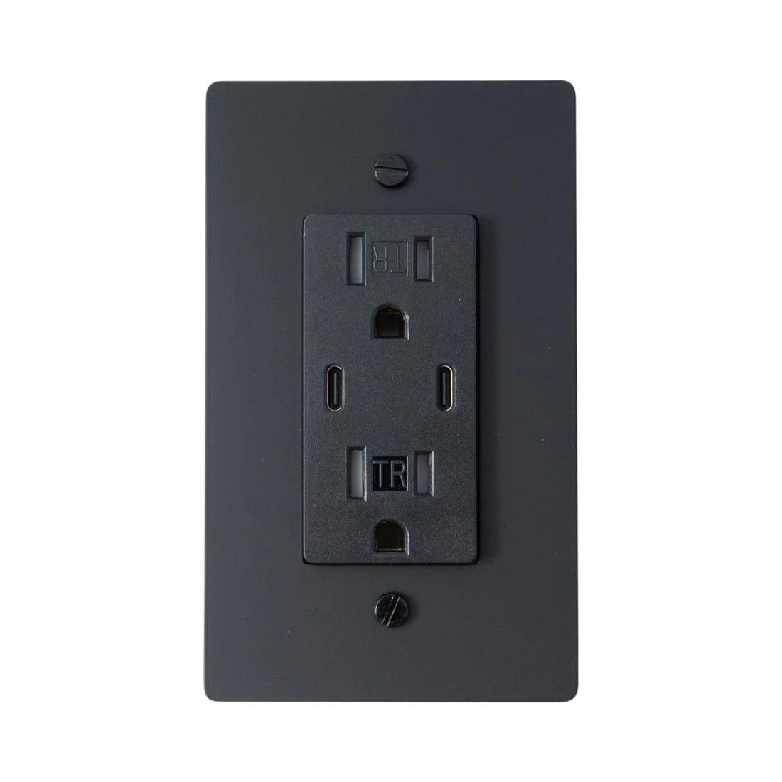 Black wall outlet with multiple sockets on a white background