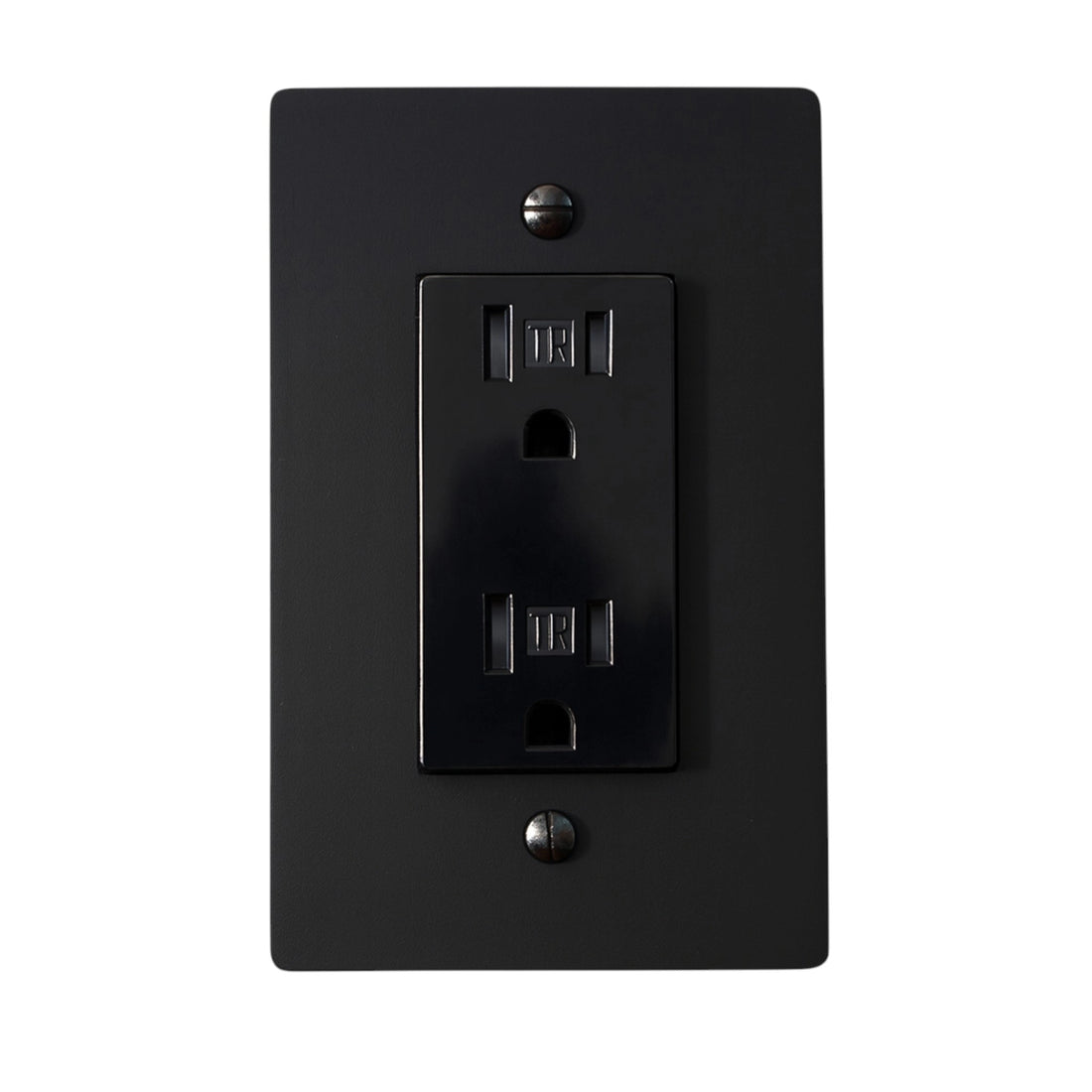 Black electrical outlet on a white background