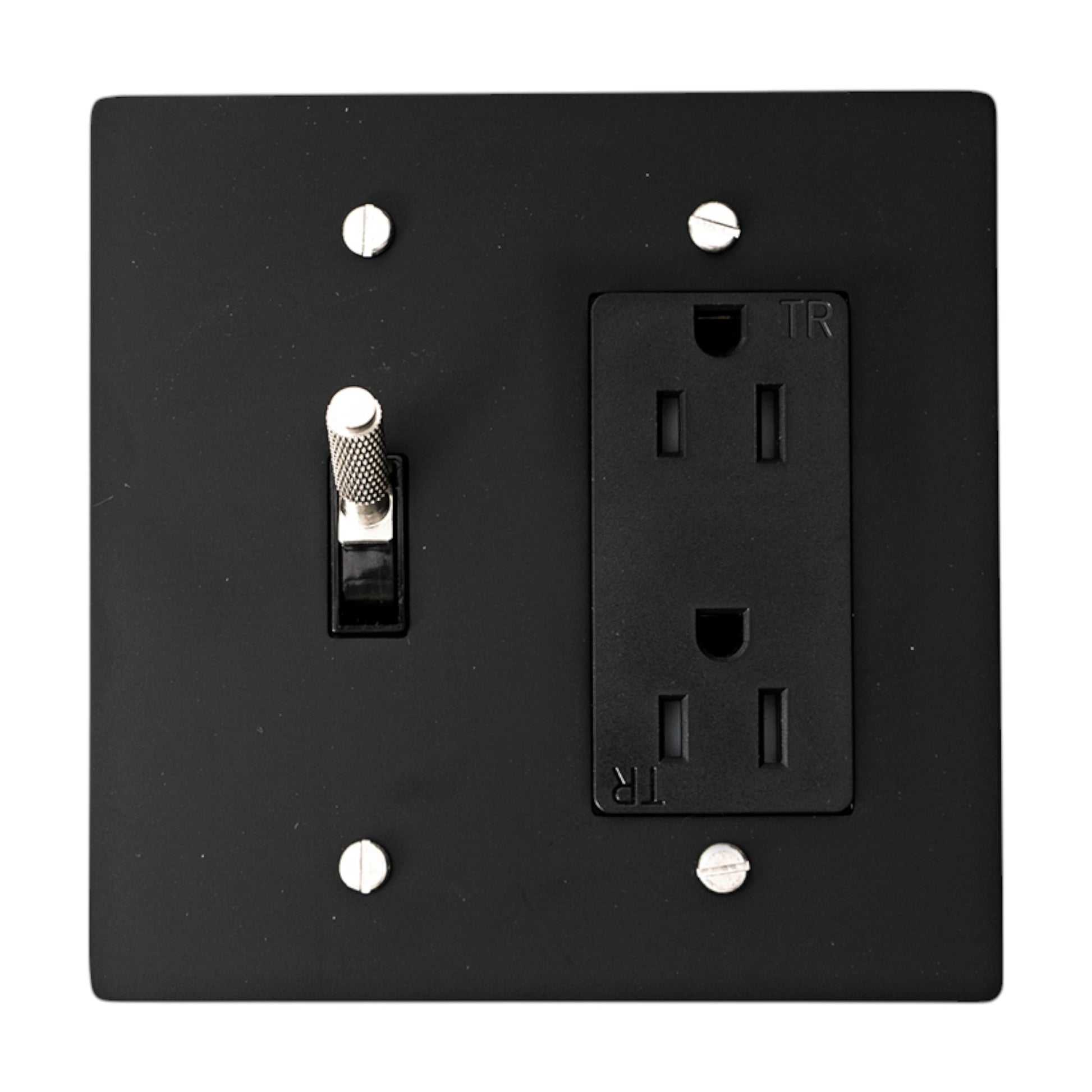 Black wall plate with a switch and outlet on a white background