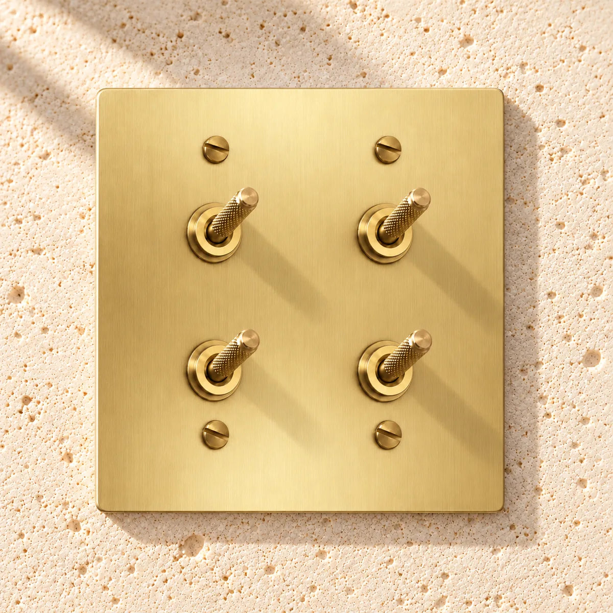 2-Gang Solid Brass Double Knurled Toggle Light Switches in Satin Brass; 4 toggles on a white background