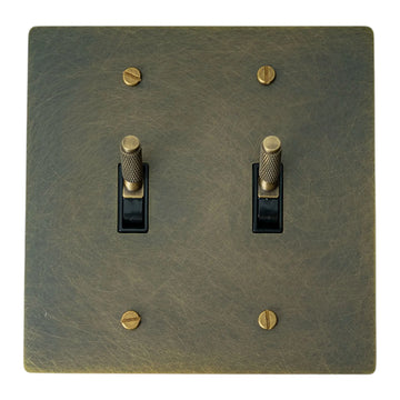 Bronze double toggle switch plate with textured surface