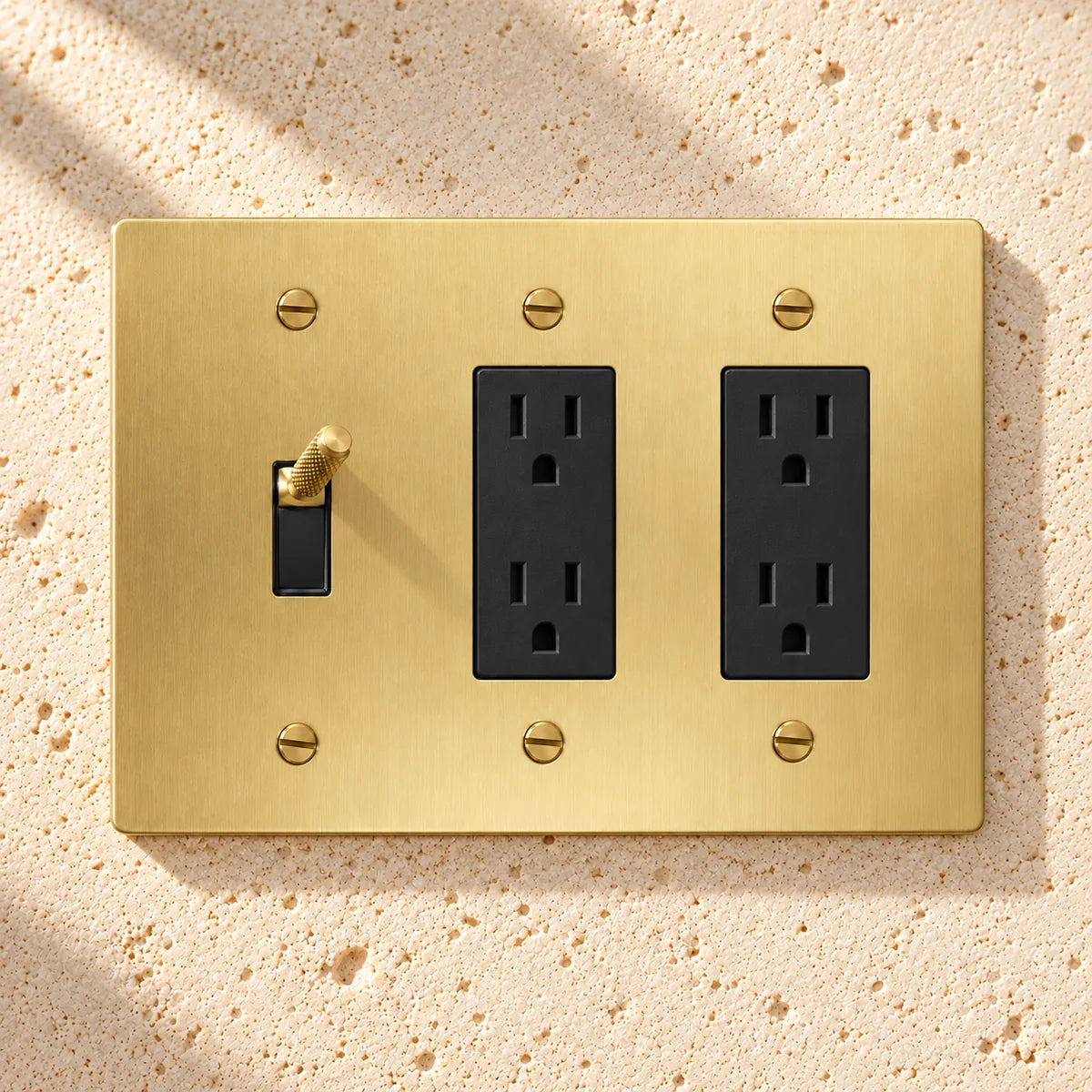 3-Gang Knurled Brass Toggle Light Switch & 2 Duplex Outlets in Satin Brass; 1 toggle + 2 duplex outlets on a white background
