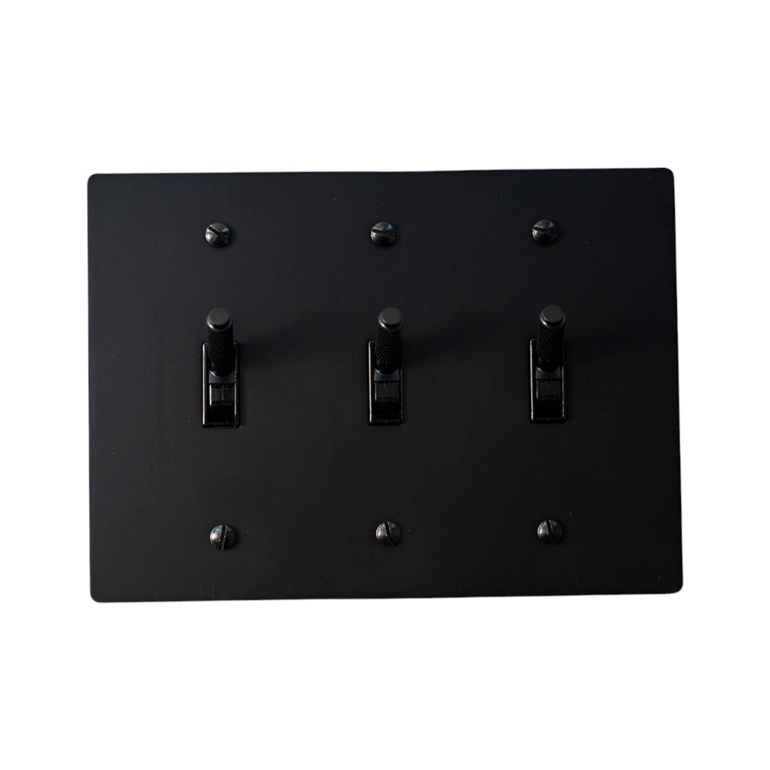 3-gang knurled toggle light switch plate in matte black, front view