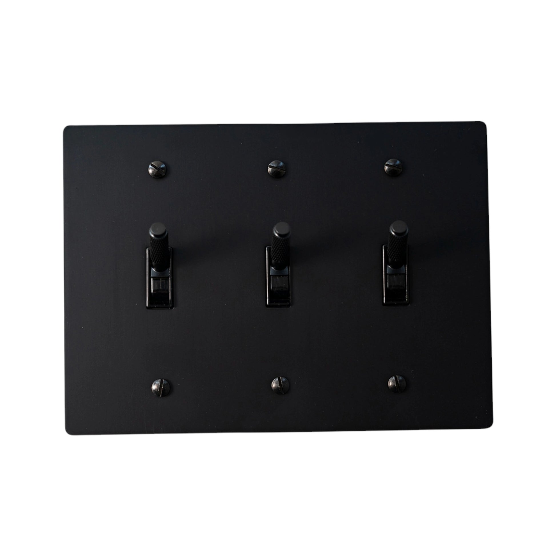 3-gang knurled toggle light switch plate in matte black, front view