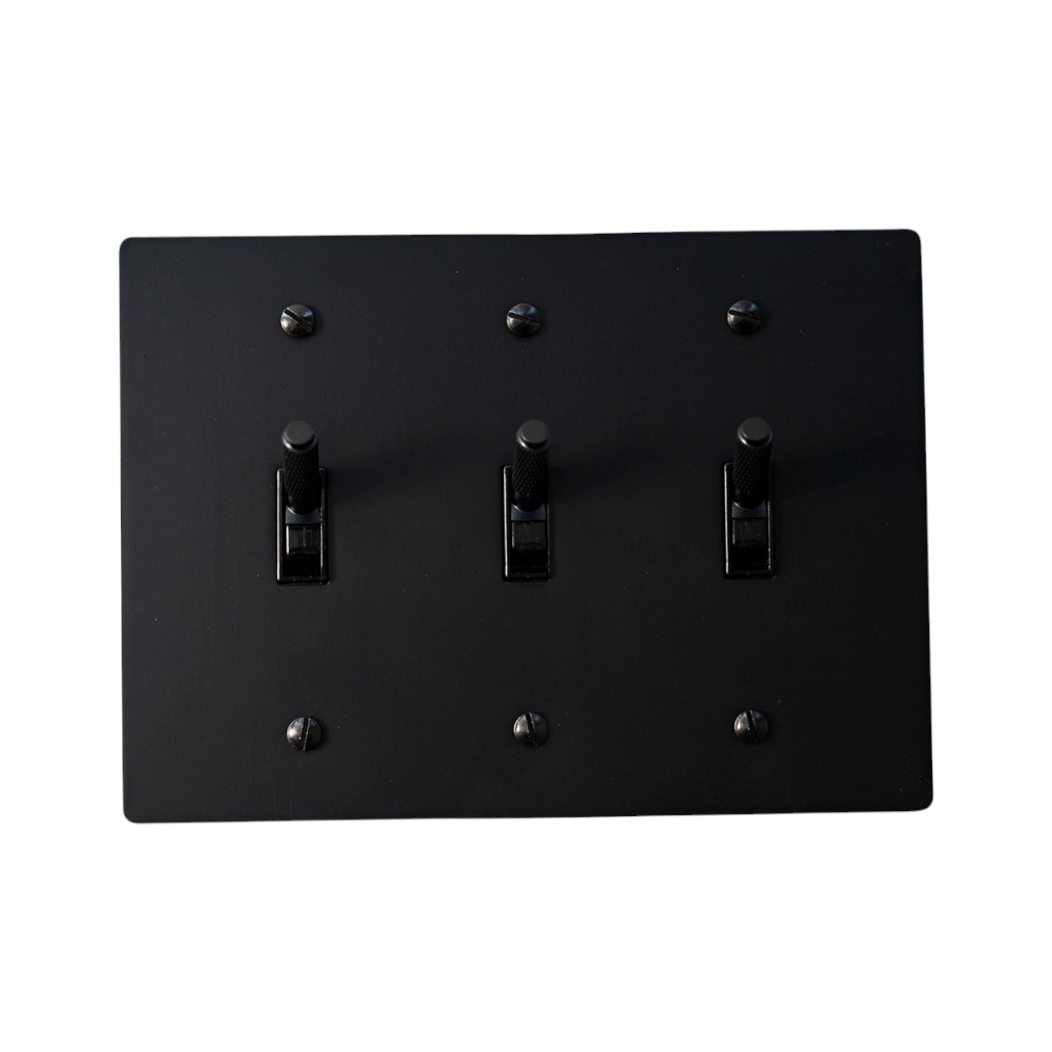 3-gang knurled toggle light switch plate in matte black, front view