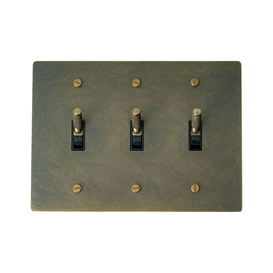 Bronze three-toggle switch plate with brass screws on a white background