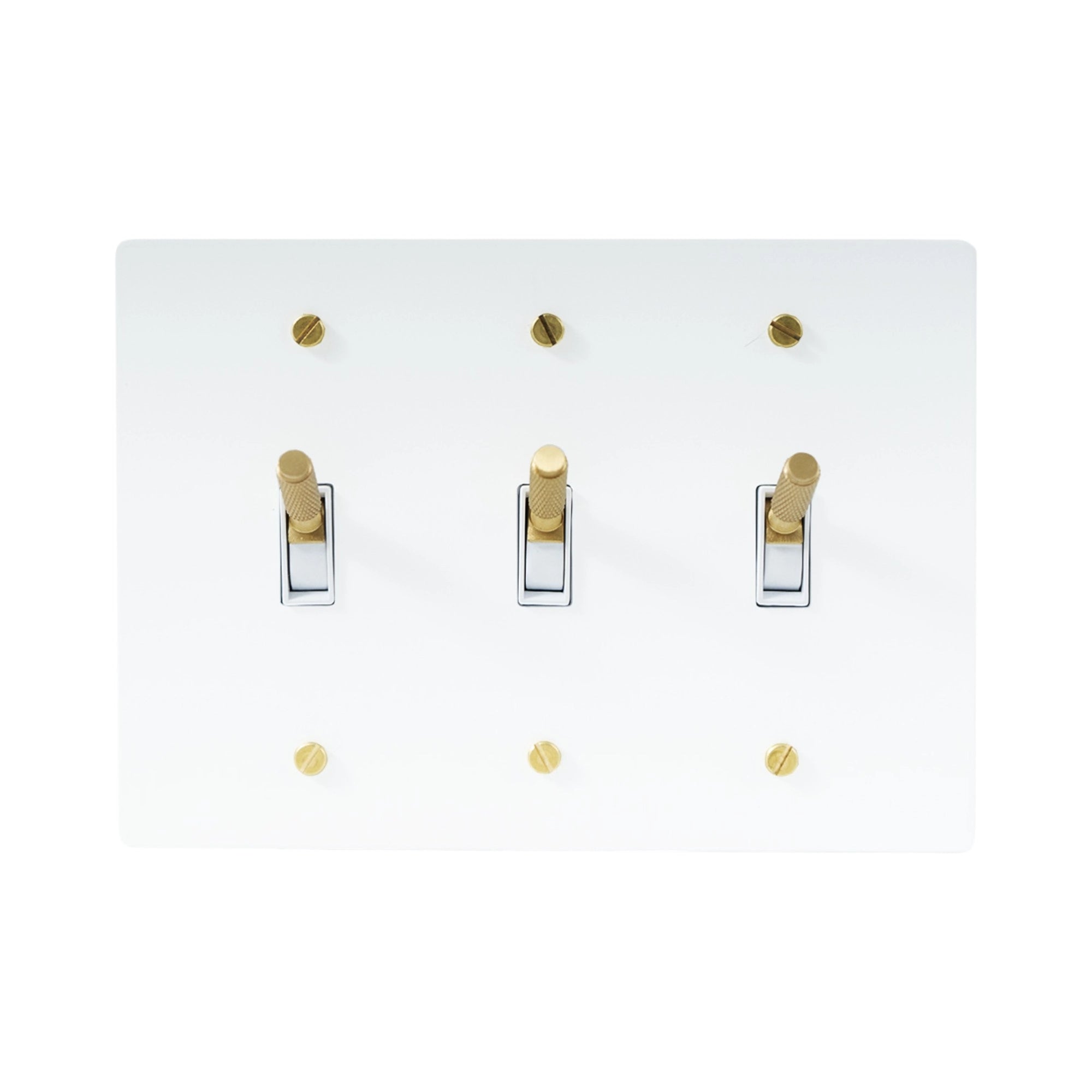 Close-up of knurled toggle detail on white 3-gang switch plate