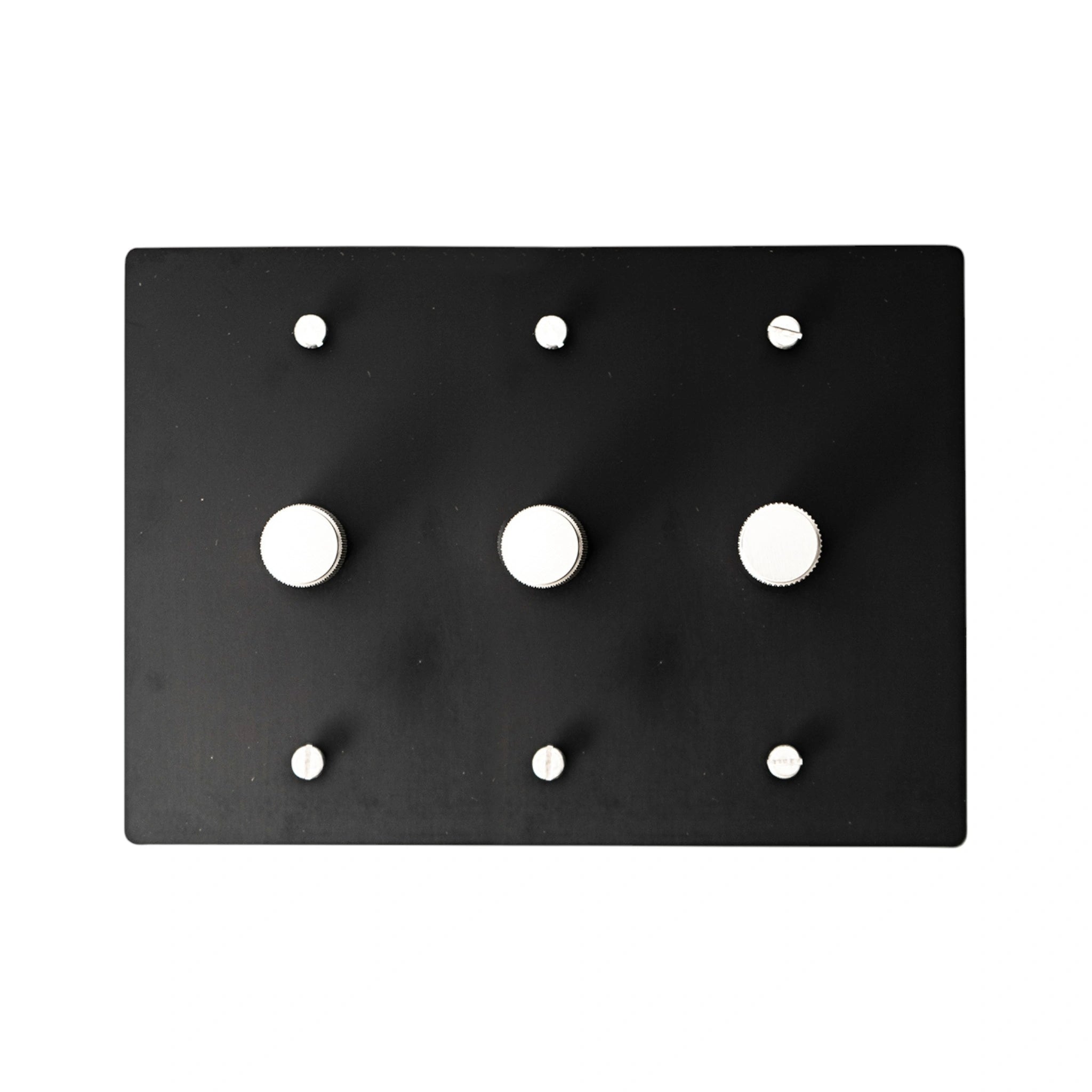 Black 3 gang dimmer switch 2ith silver knobs on a white background