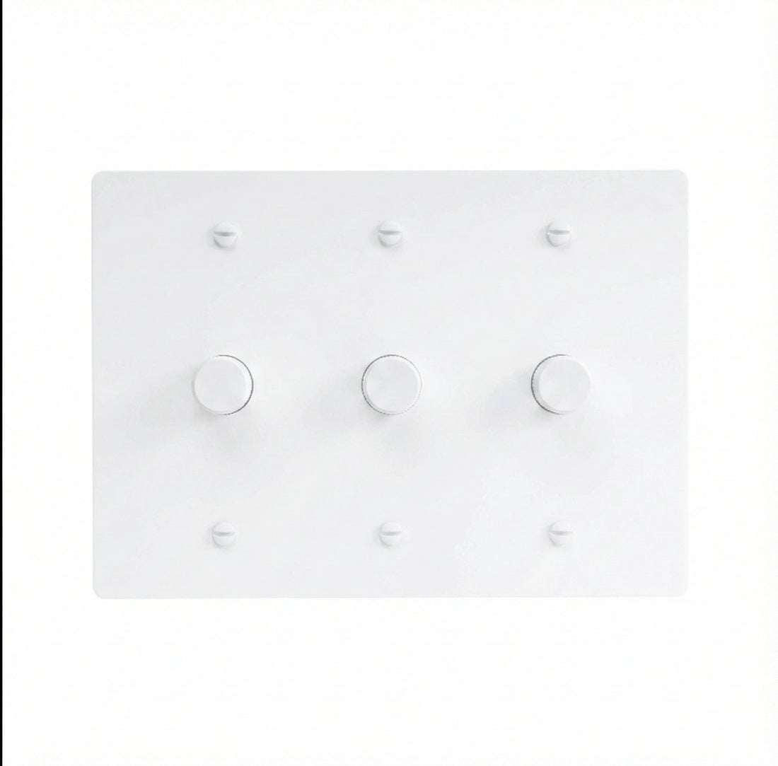 White light switch panel with multiple switches on a white background