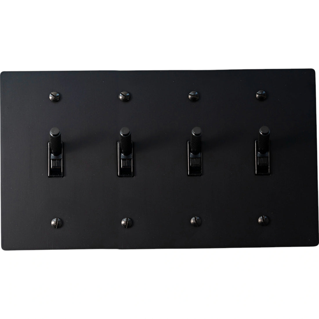 4-gang knurled toggle light switch plate in matte black, front view