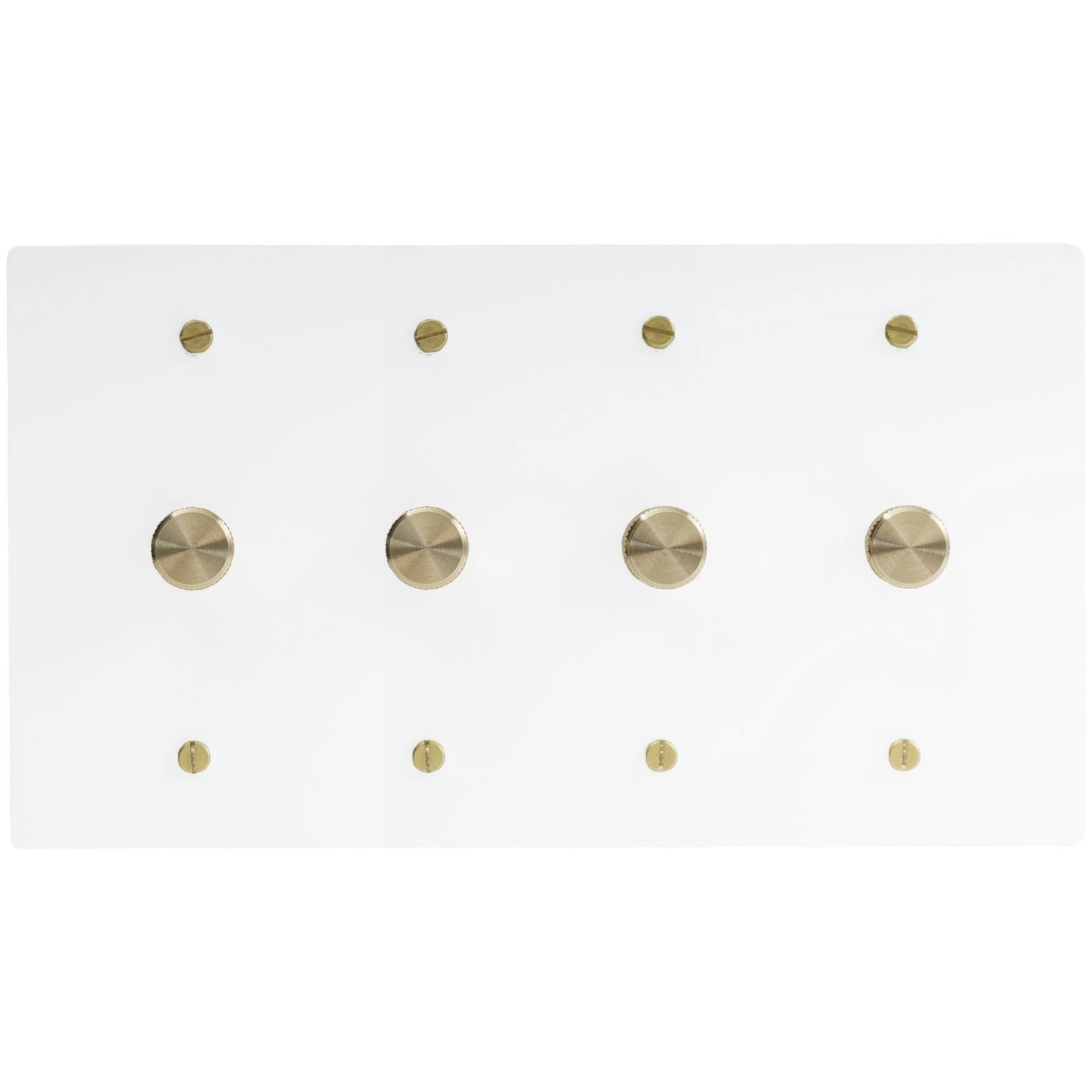 Four gang white dimmer switch panel with brass rotary knobs on minimalist glossy white plate.