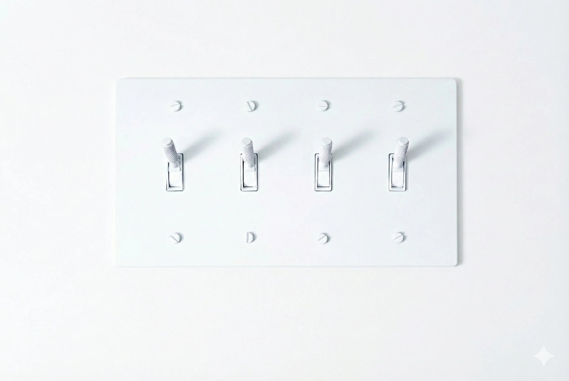 4-gang knurled toggle light switch plate in white, front view