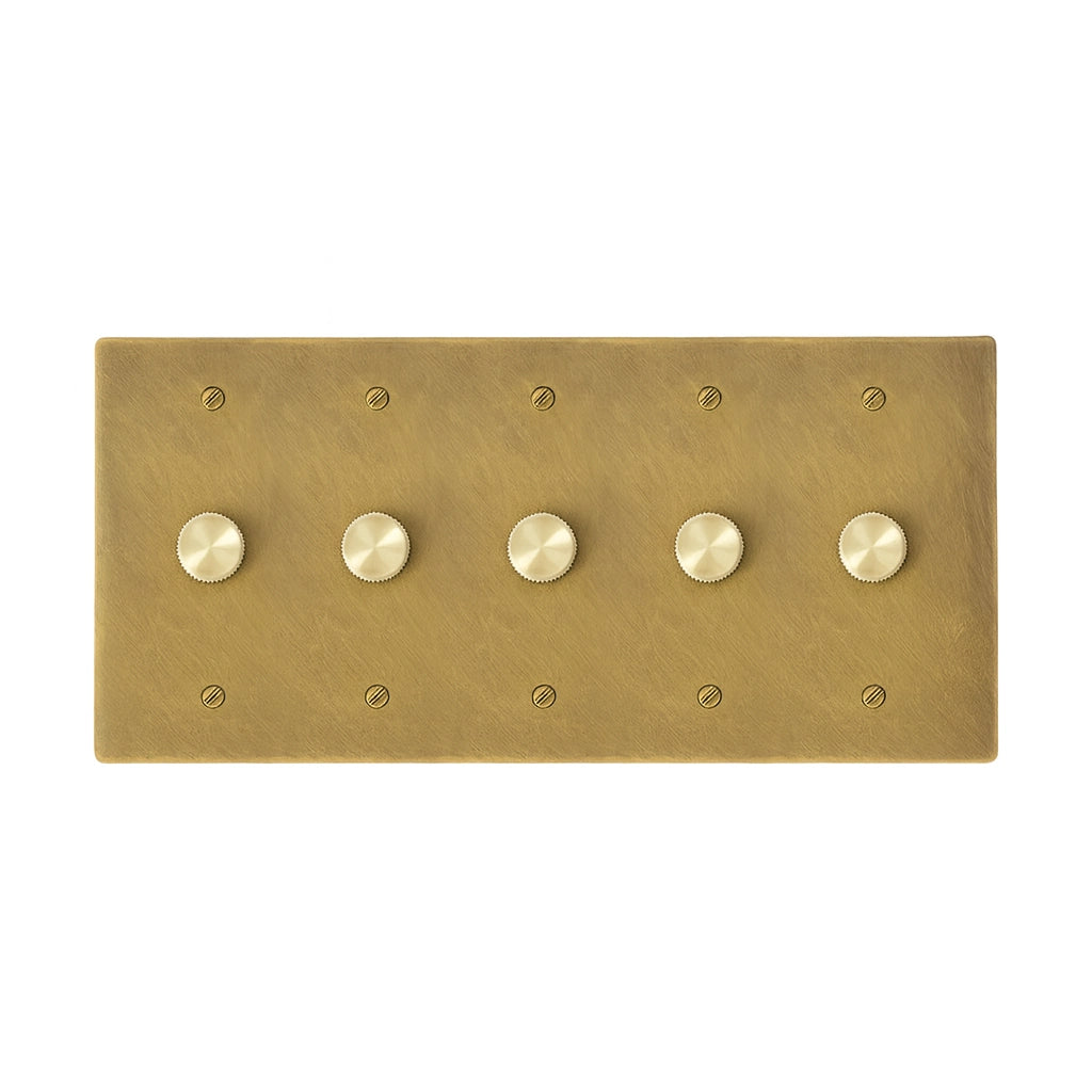 Five gang antique brushed brass dimmer switch plate with smooth rotary knobs for multi-light control.