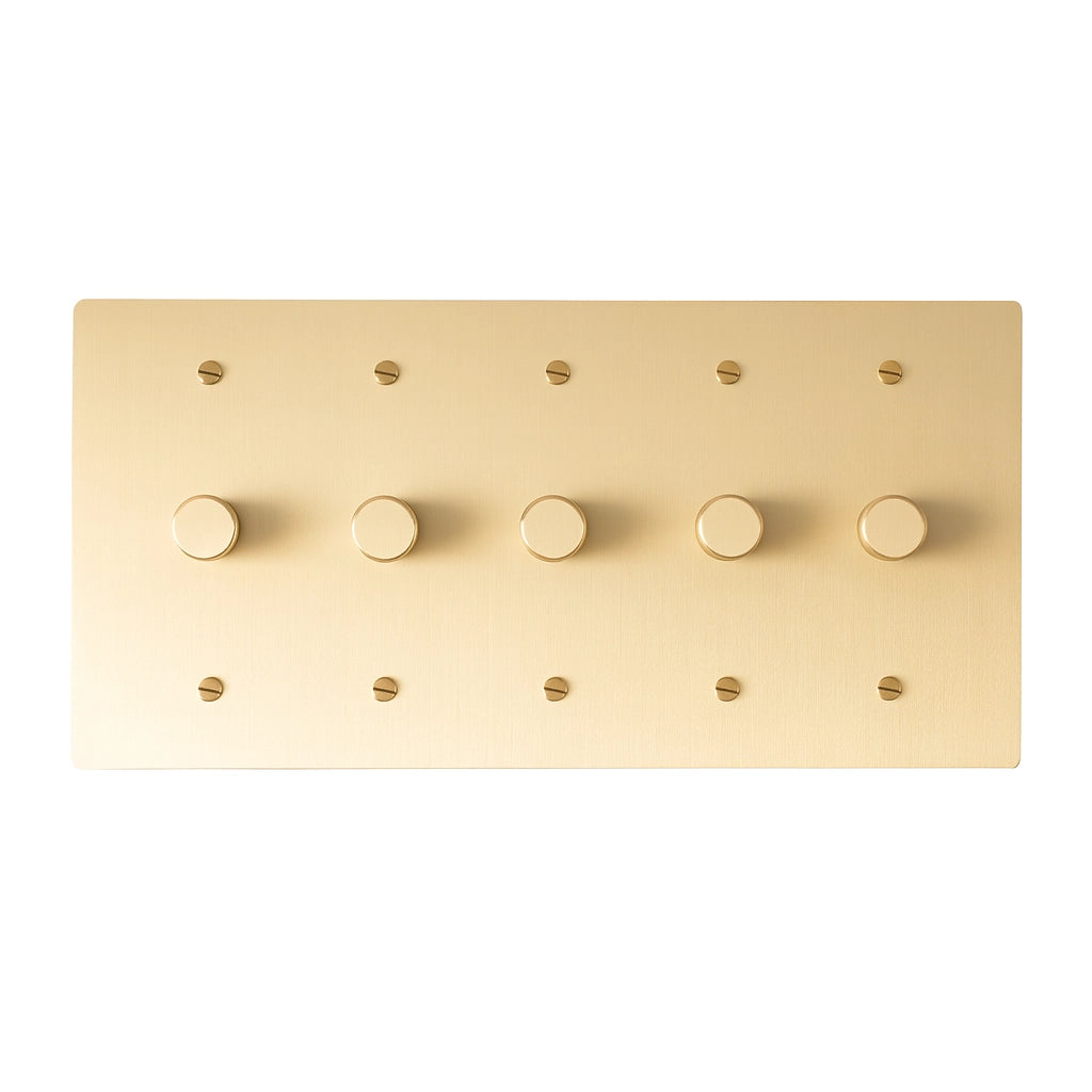 Five gang brass dimmer wall plate with evenly spaced rotary knobs and warm satin finish.