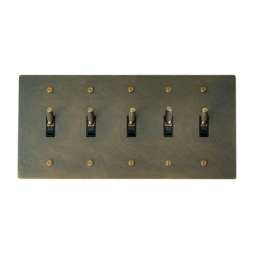 5-gang knurled toggle light switch plate in aged bronze, hand-brushed, front view