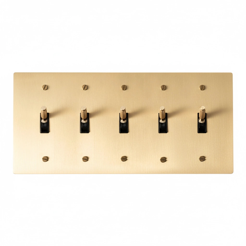 5-gang knurled toggle light switch plate in satin brass, front view