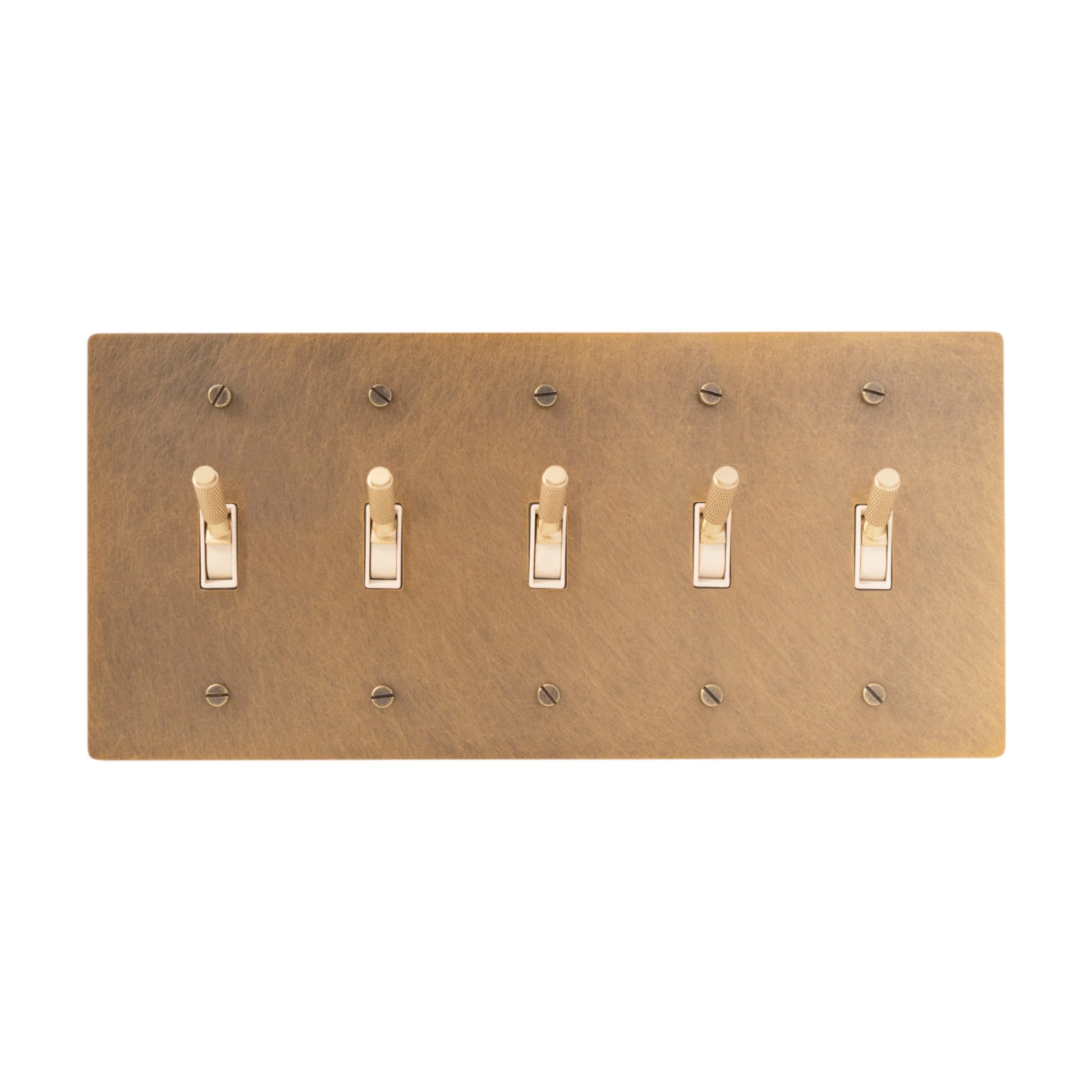 Close-up of knurled toggles on unlacquered antique brass 5-gang switch plate