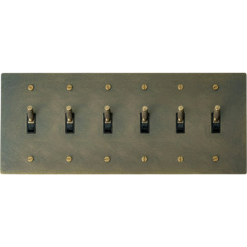 6-gang knurled toggle light switch plate in aged bronze, hand-brushed, front view