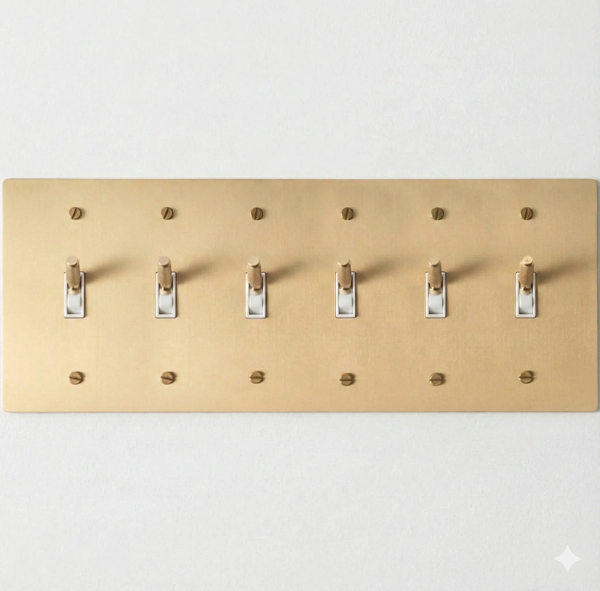 Satin brass 6-gang knurled toggle switch plate