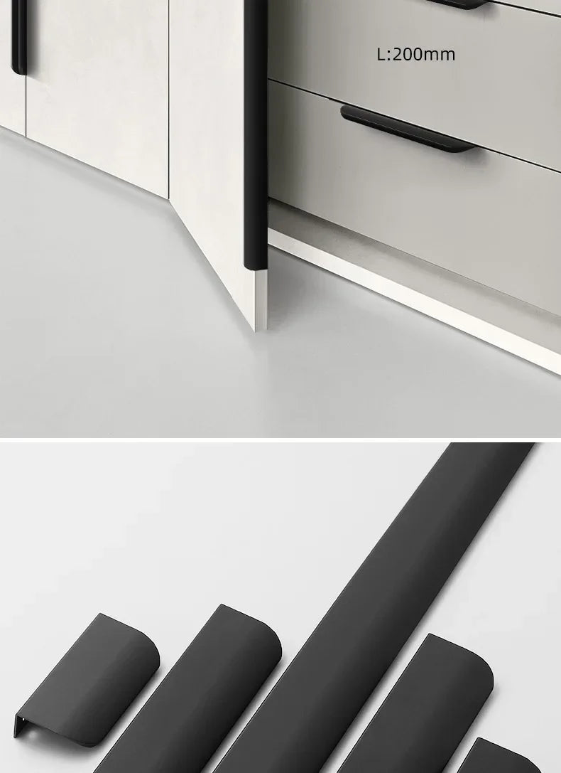 Close-up of a kitchen cabinet with a black aluminum edge pull and additional black aluminum edge pulls on a white background.