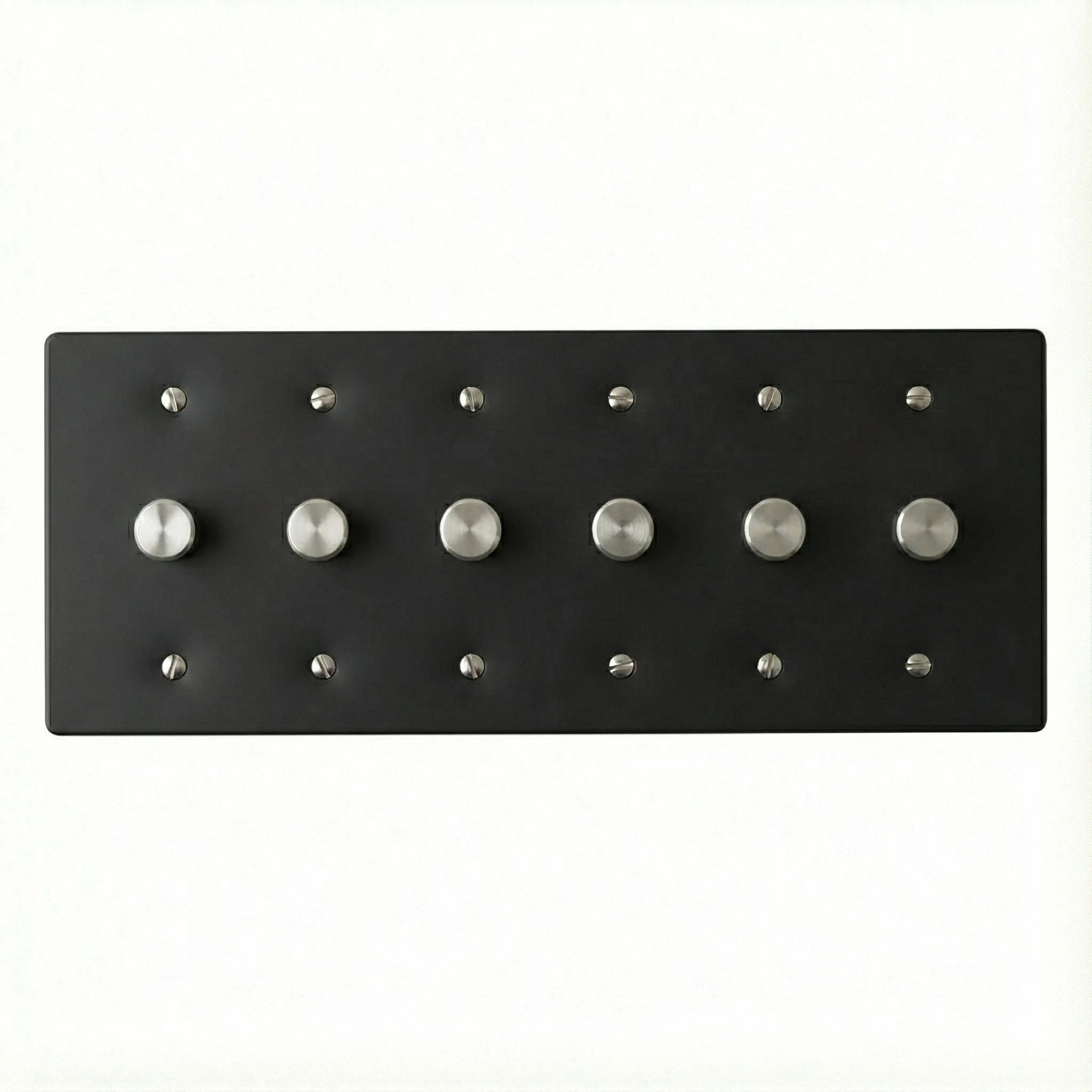 Black rotary dimmer rectangular plate with silver knobs on a white background