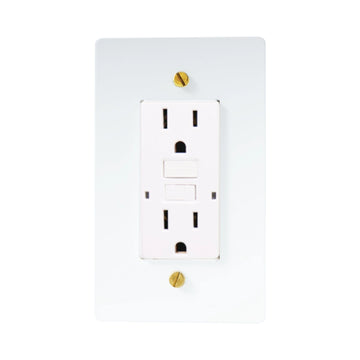 White GFCI electrical outlet with gold screws on a white background