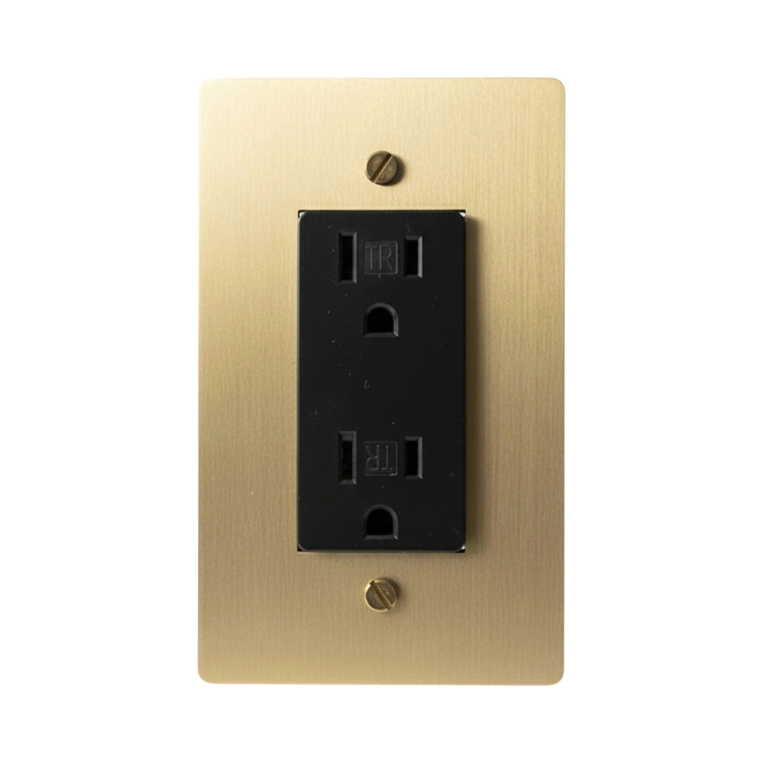 Black electrical outlet on a gold wall plate with screws