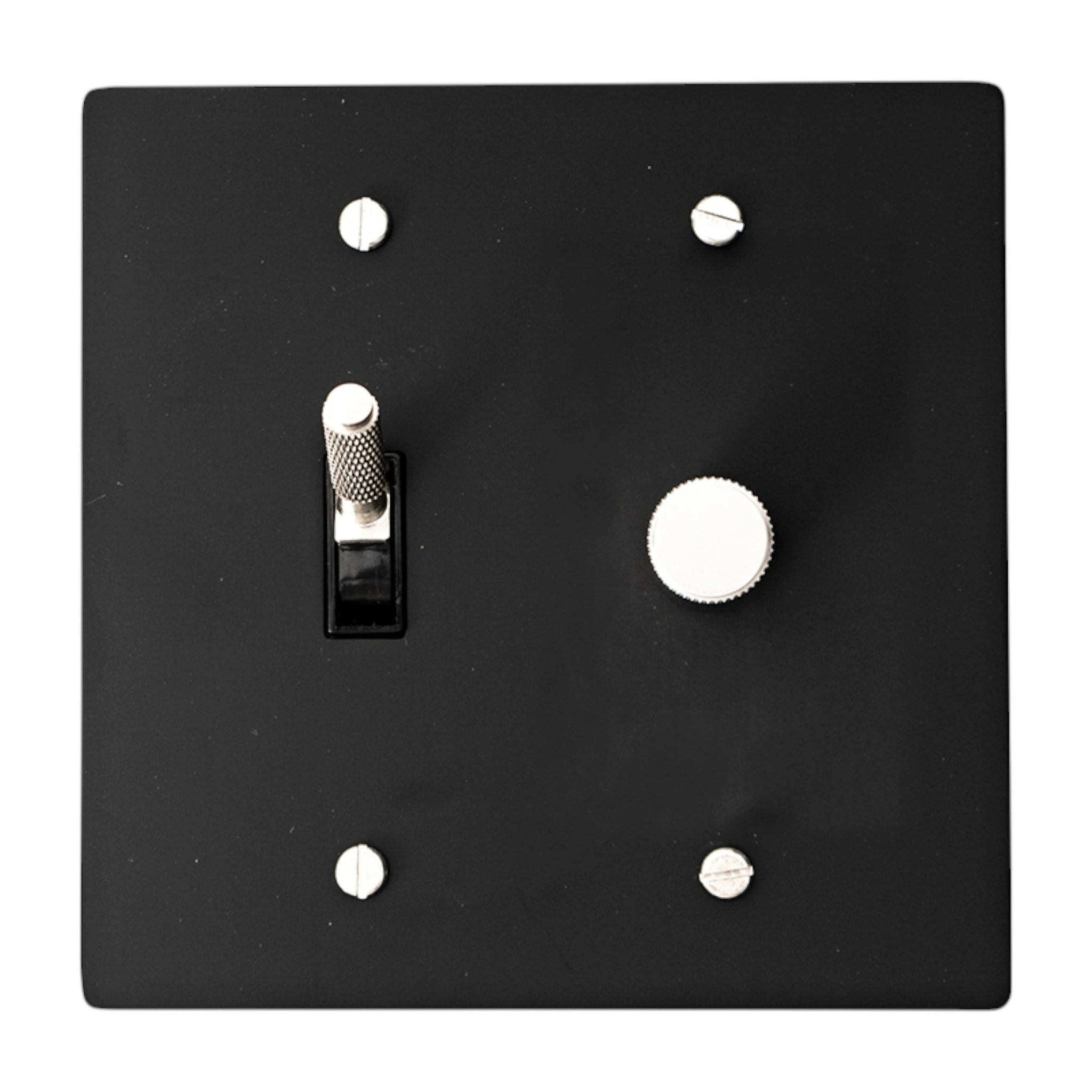 Black light switch plate with a single toggle switch and rotary dimmer on a white background