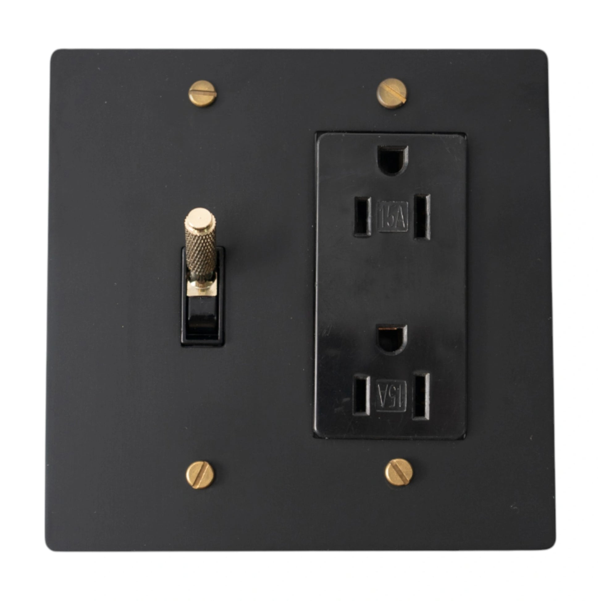 Black wall plate with a switch and outlet on a white background