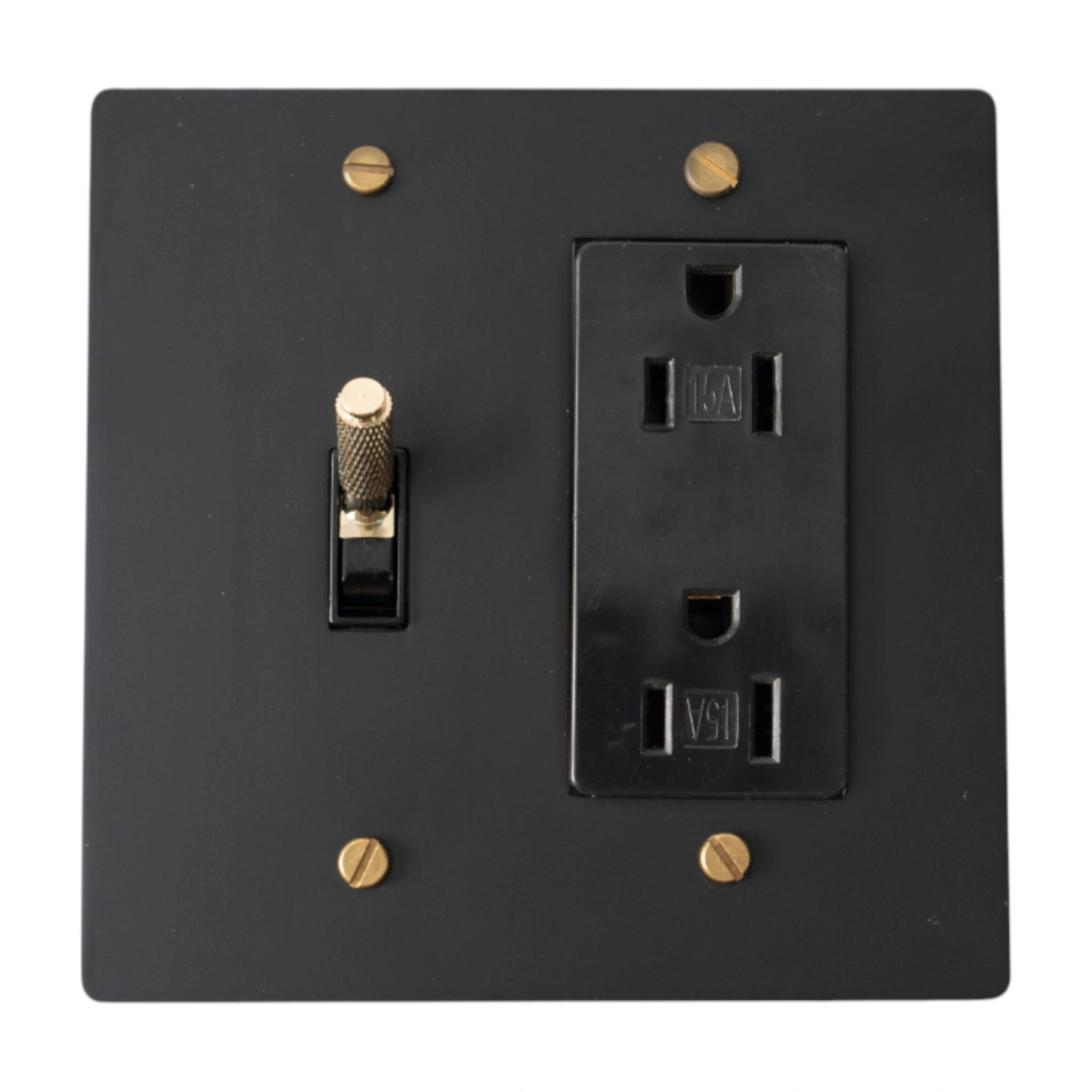 Black wall plate with a switch and outlet on a white background