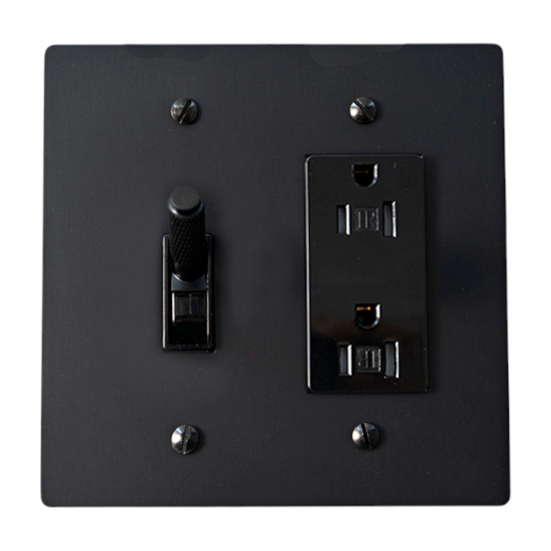 Black wall switch and socket combination on a white background