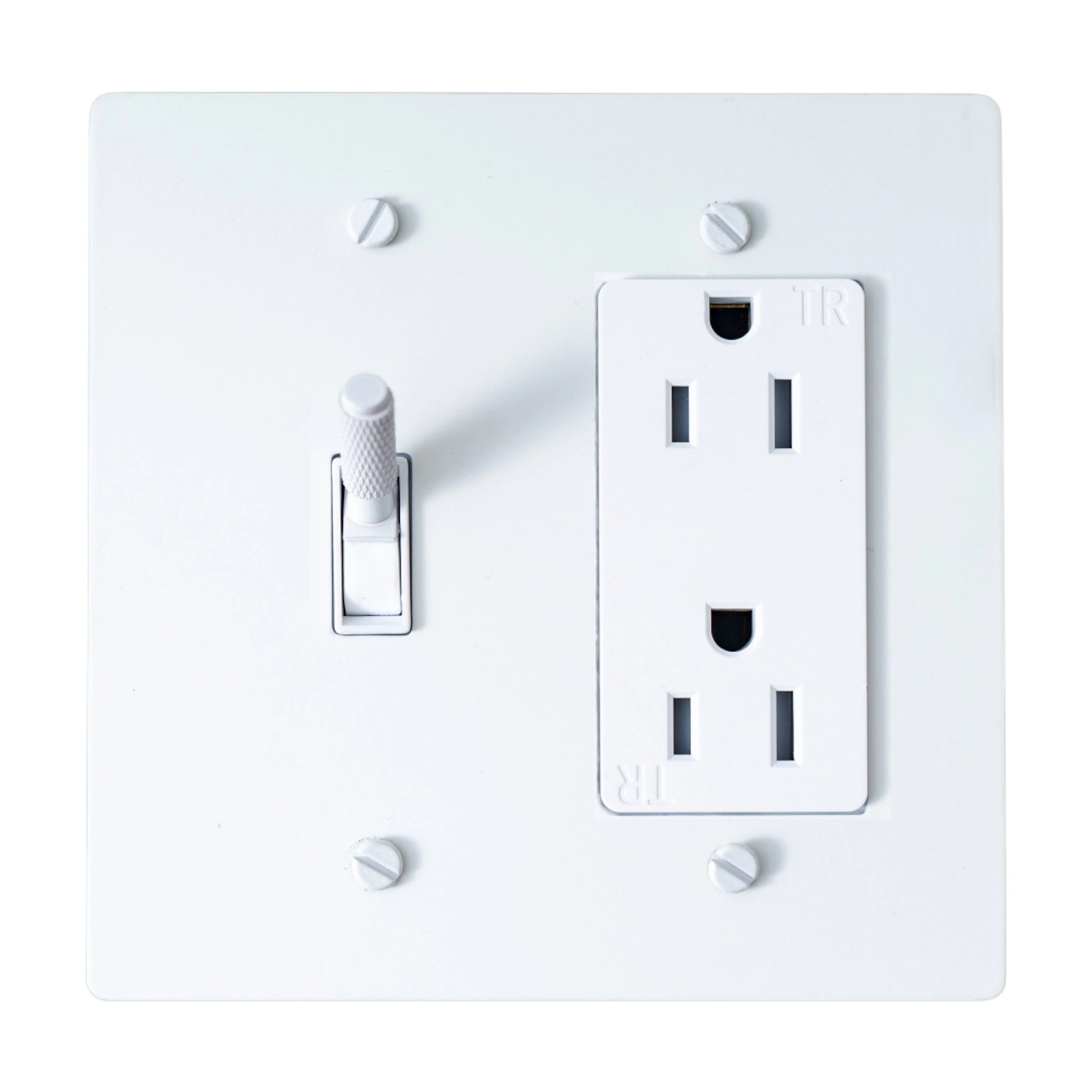 White electrical outlet and toggle combo with cover plate on a white background