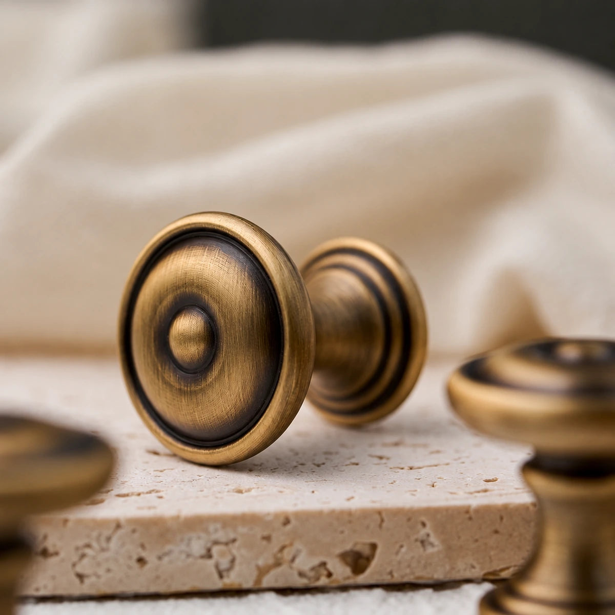 Close-up of the bullseye cabinet knob face, rim and pedestal base