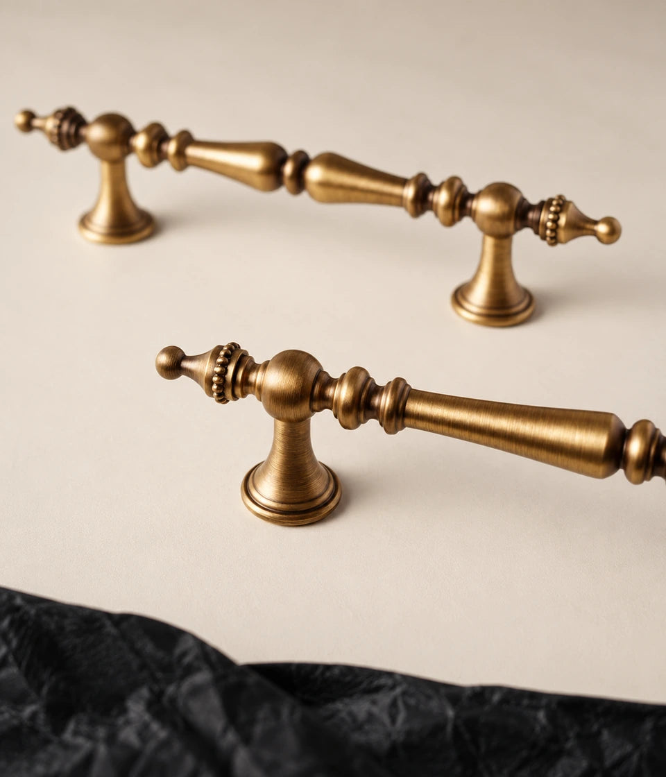 Beaded crown finial cabinet pulls in antique brushed brass