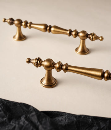 Beaded crown finial cabinet pulls in antique brushed brass