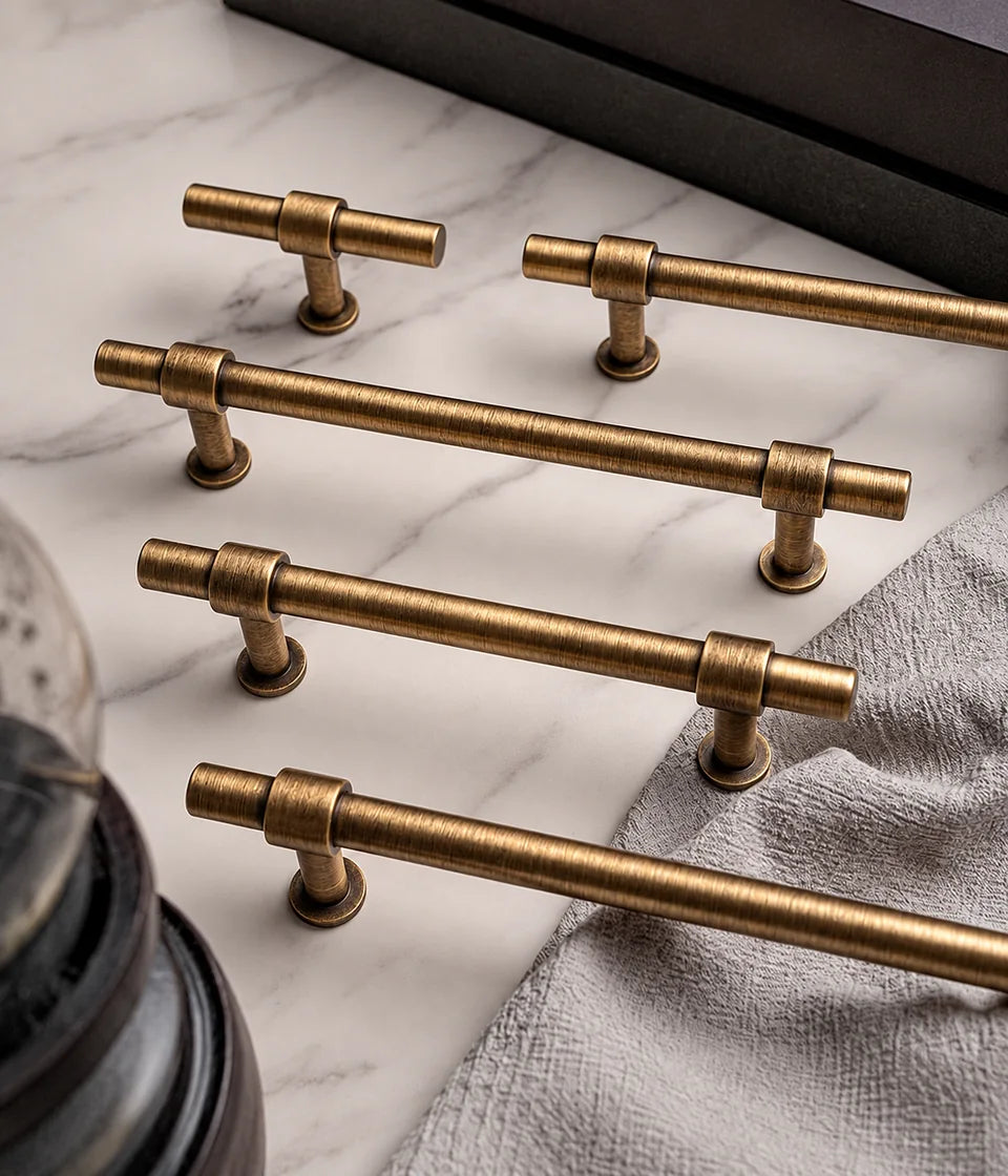 Antique brass cylinder cabinet pulls and coordinating knobs
