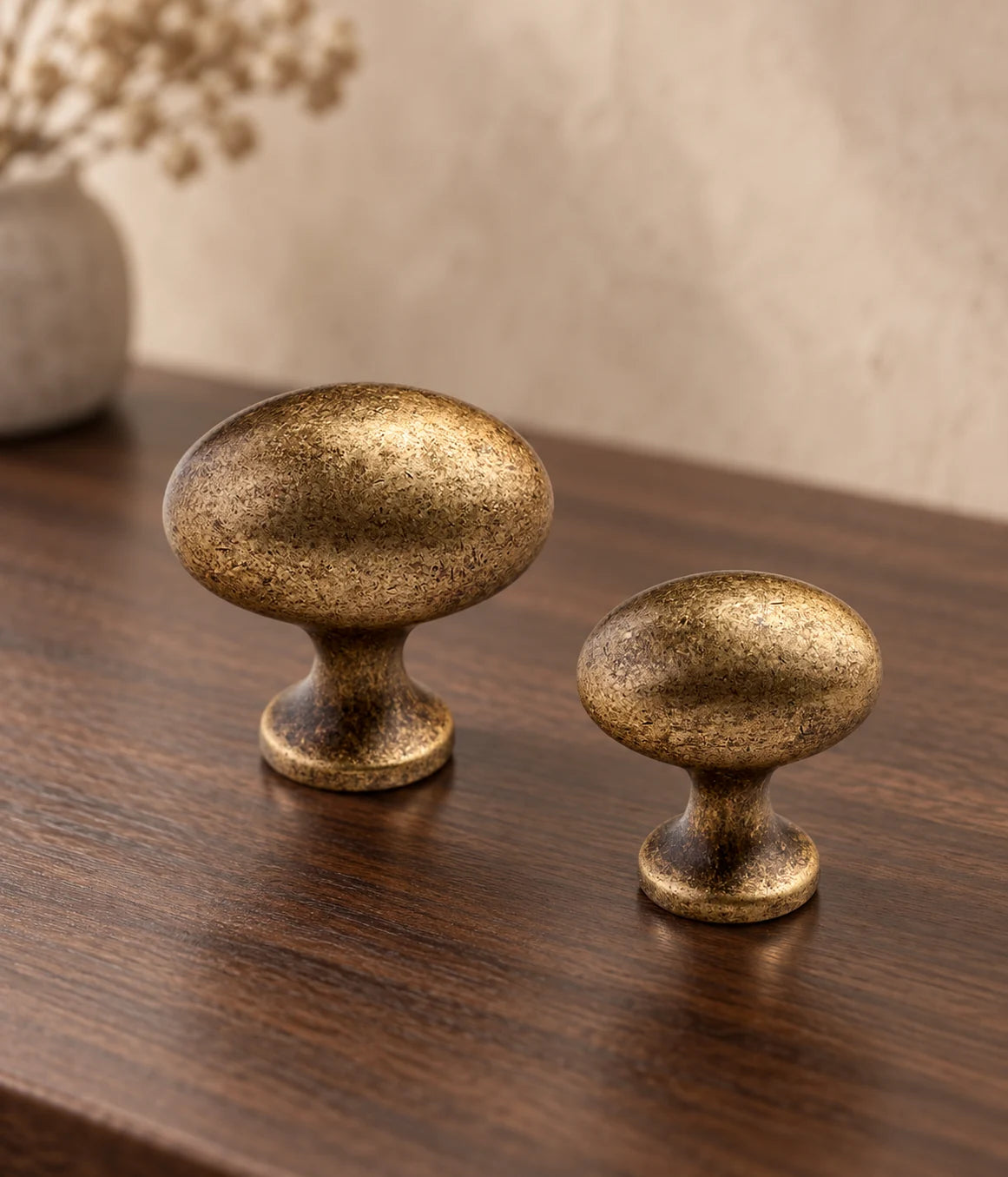 Distressed antique brass egg cabinet knobs in 27 mm and 35 mm face sizes