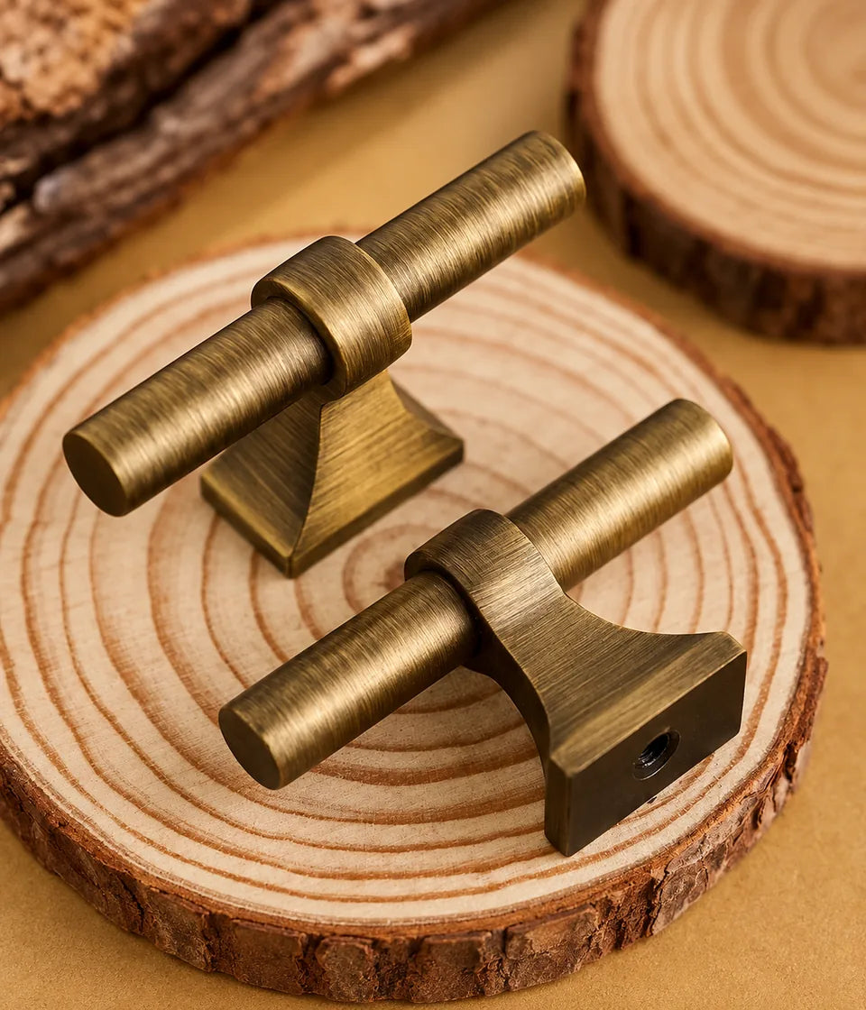 Antique brass T-knob and underside mounting hole on a wood slice
