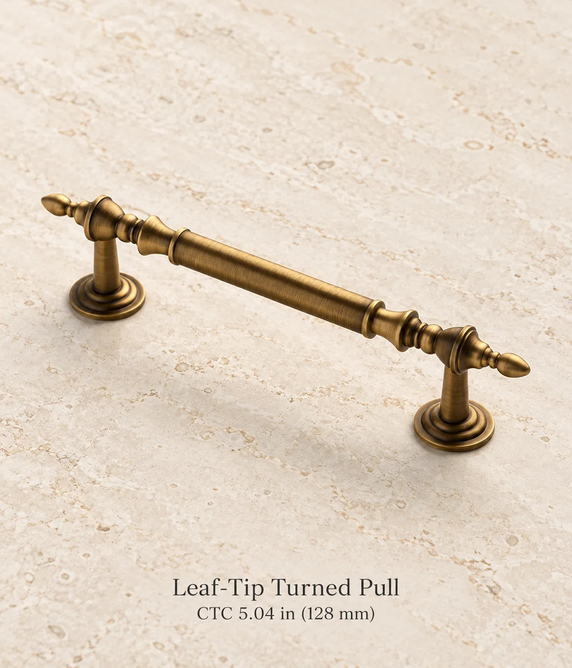 Antique brass leaf-tip turned cabinet pull, 5.04 inch (128 mm) center-to-center mounting holes