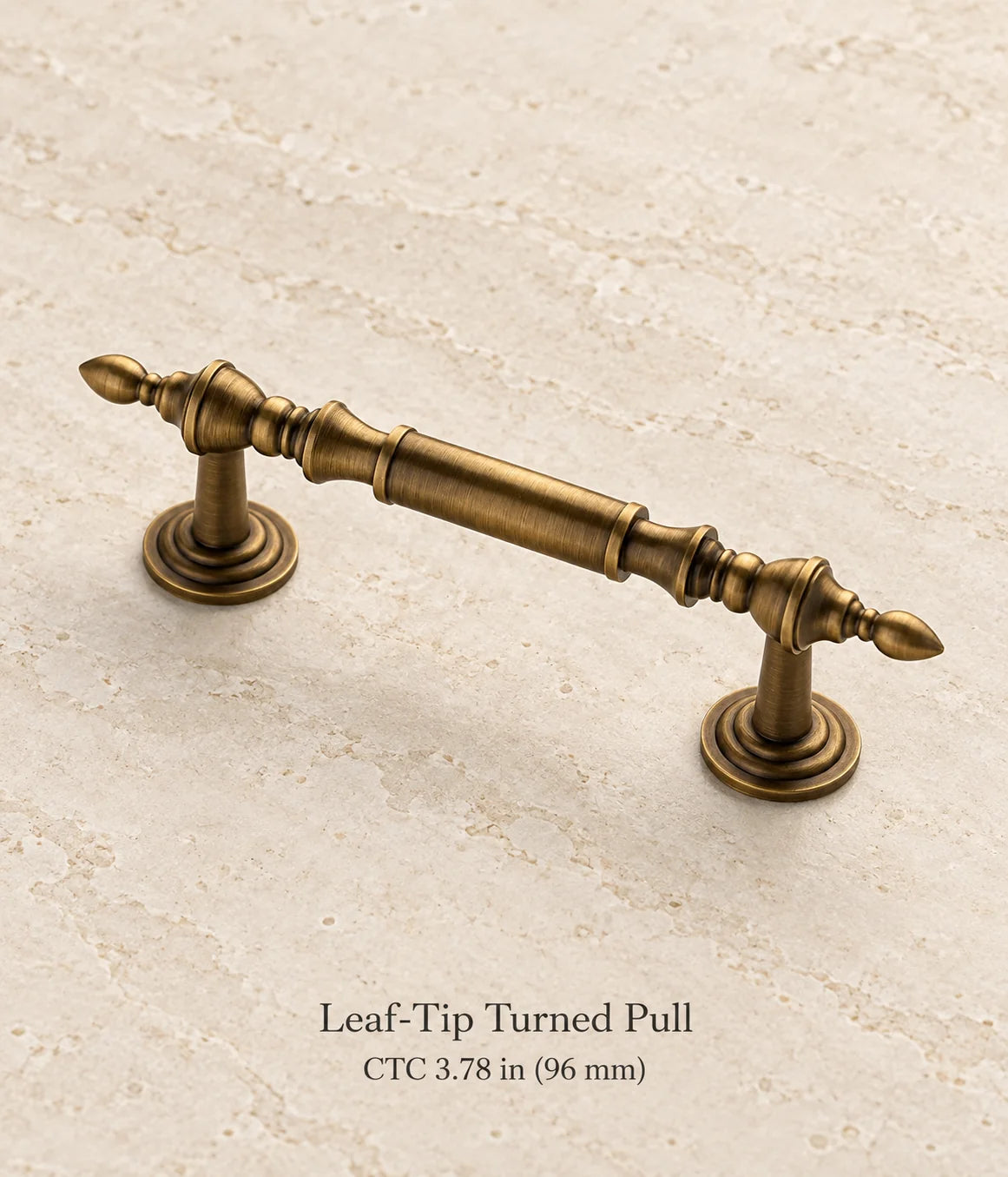 Antique brass leaf-tip turned cabinet pull, 3.78 inch (96 mm) center-to-center mounting holes