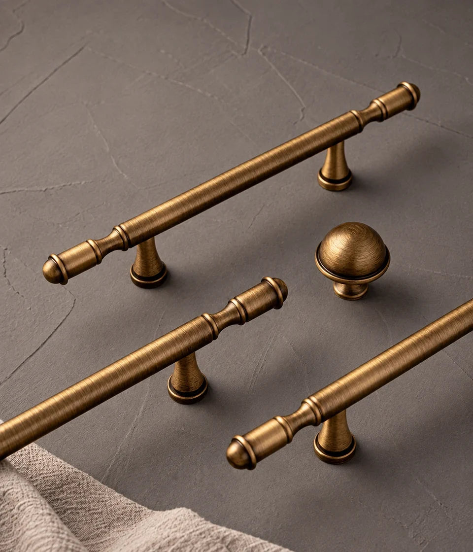 Antique brass ringed cabinet hardware — hero