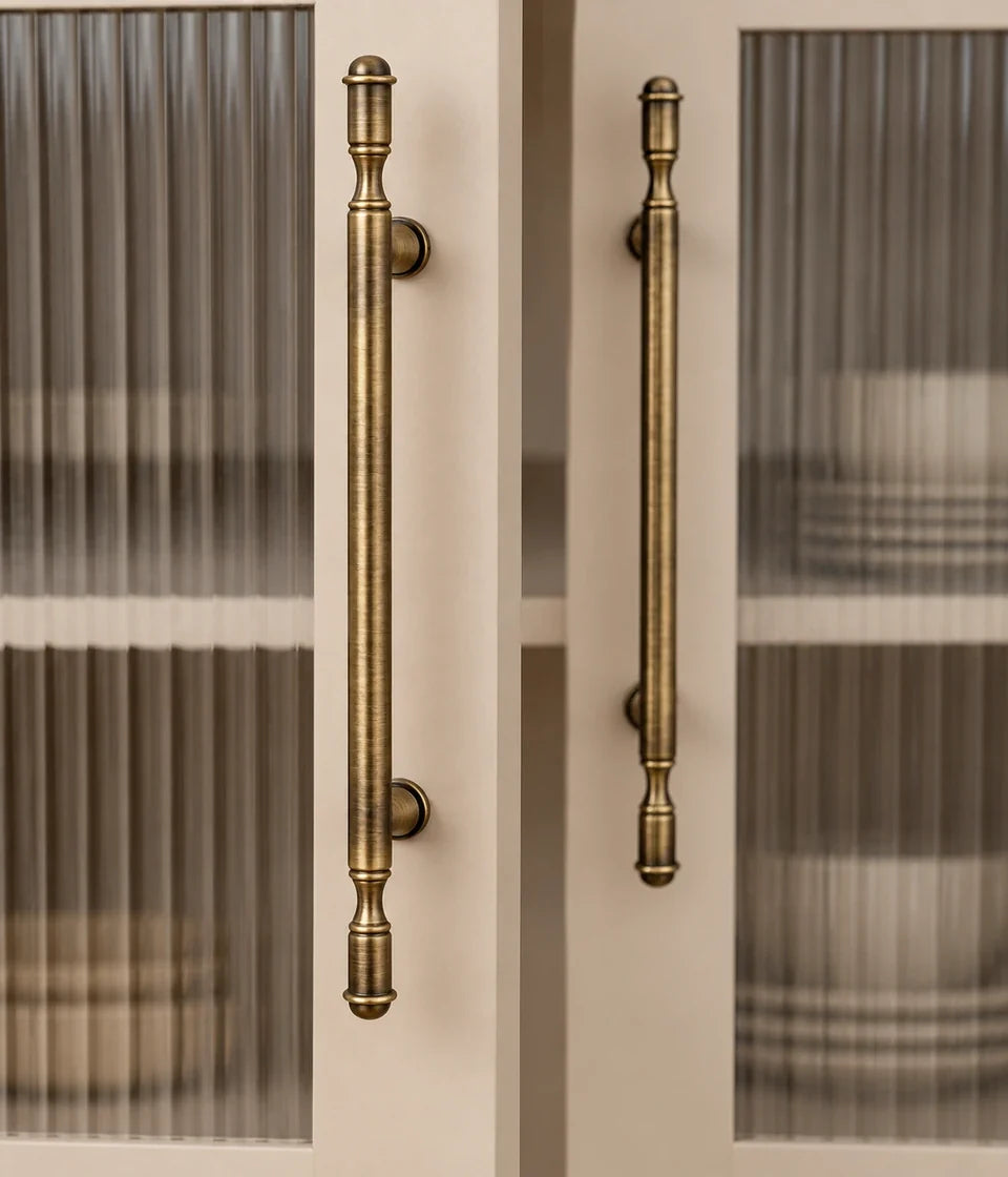 Antique brass ringed cabinet hardware — hover