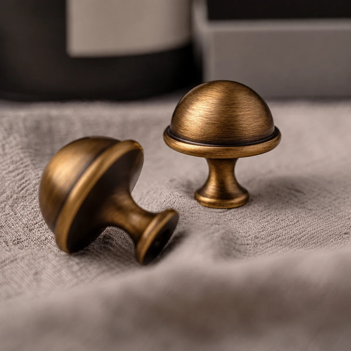 Antique brass ringed cabinet hardware — knob detail