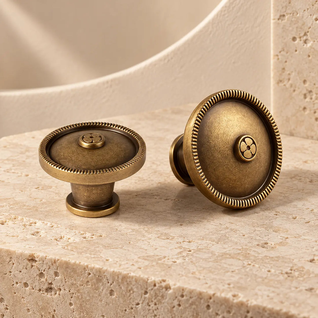 Antique brass rope-rim button cabinet knobs in 1.10 inch and 1.26 inch diameters