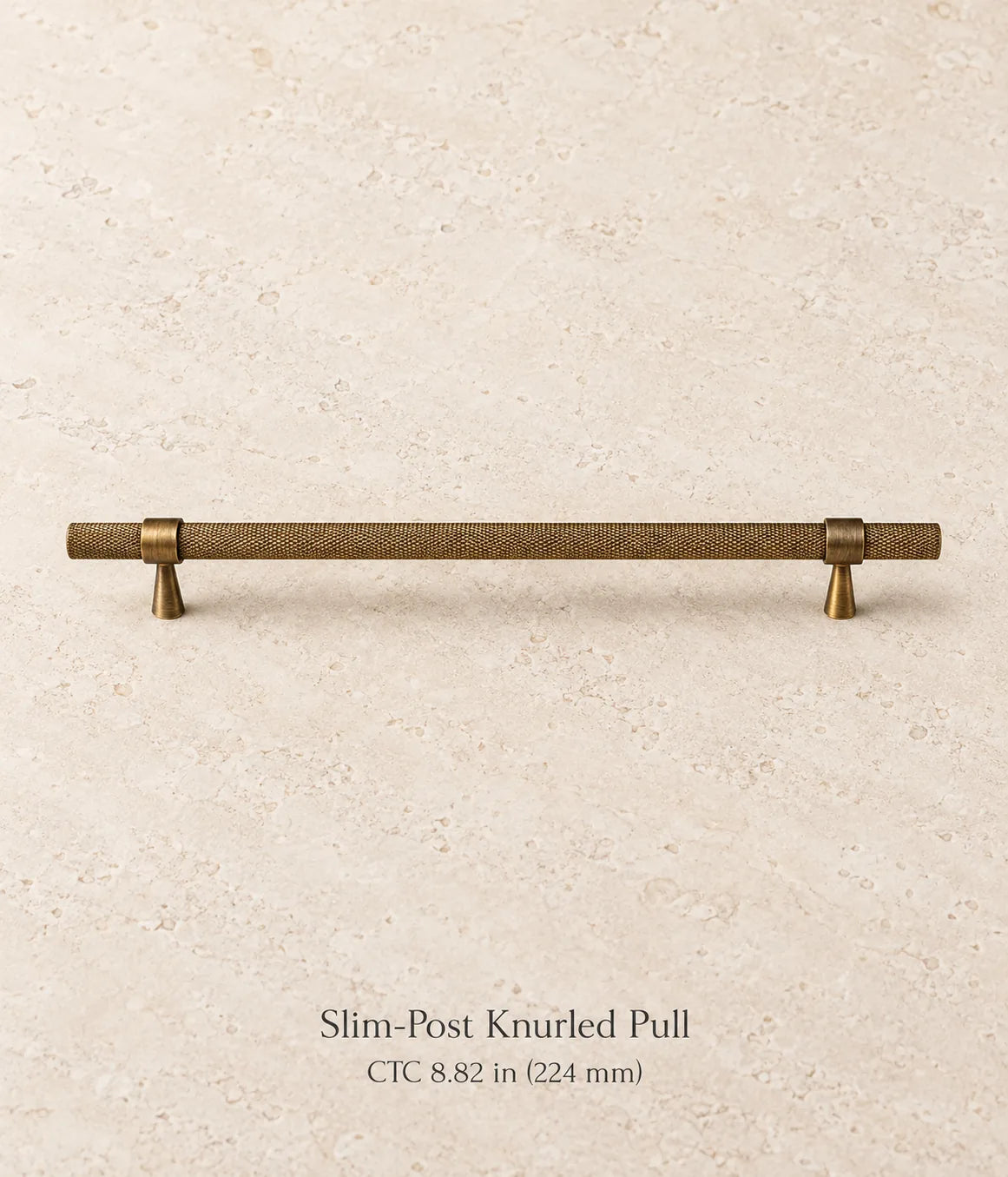 Antique brass slim-post knurled cabinet pull, 8.82 in (224 mm) CTC