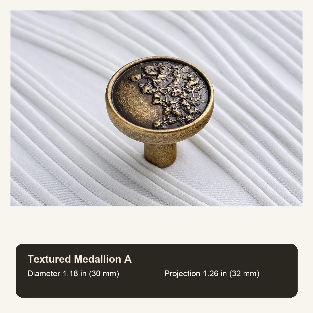 Antique brass Textured Medallion A cabinet knob with inch and mm dimensions