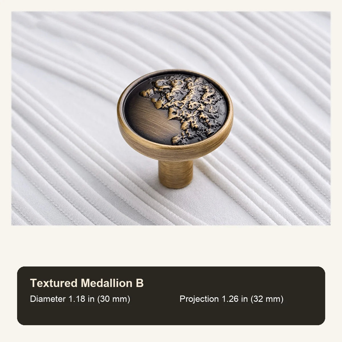 Antique brass Textured Medallion B cabinet knob with inch and mm dimensions