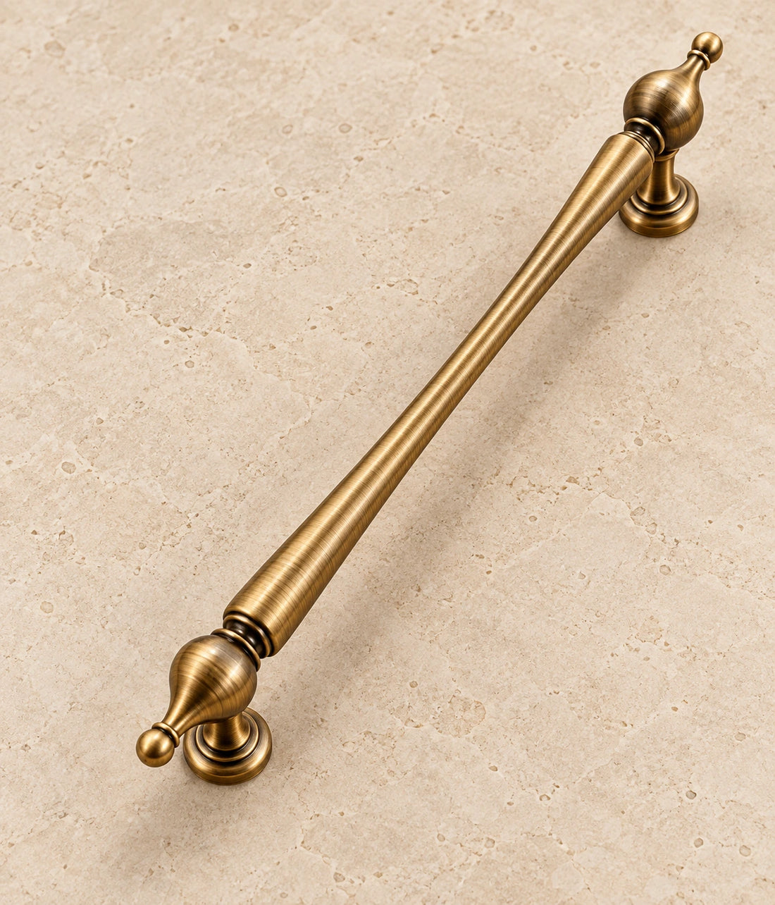 Antique Brass Urn-Finial Cabinet Pulls & Pendant on warm limestone